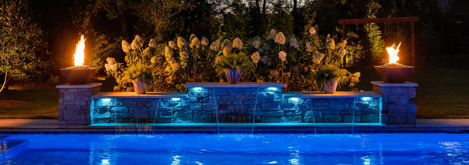 hardscape lighting on outdoor pool