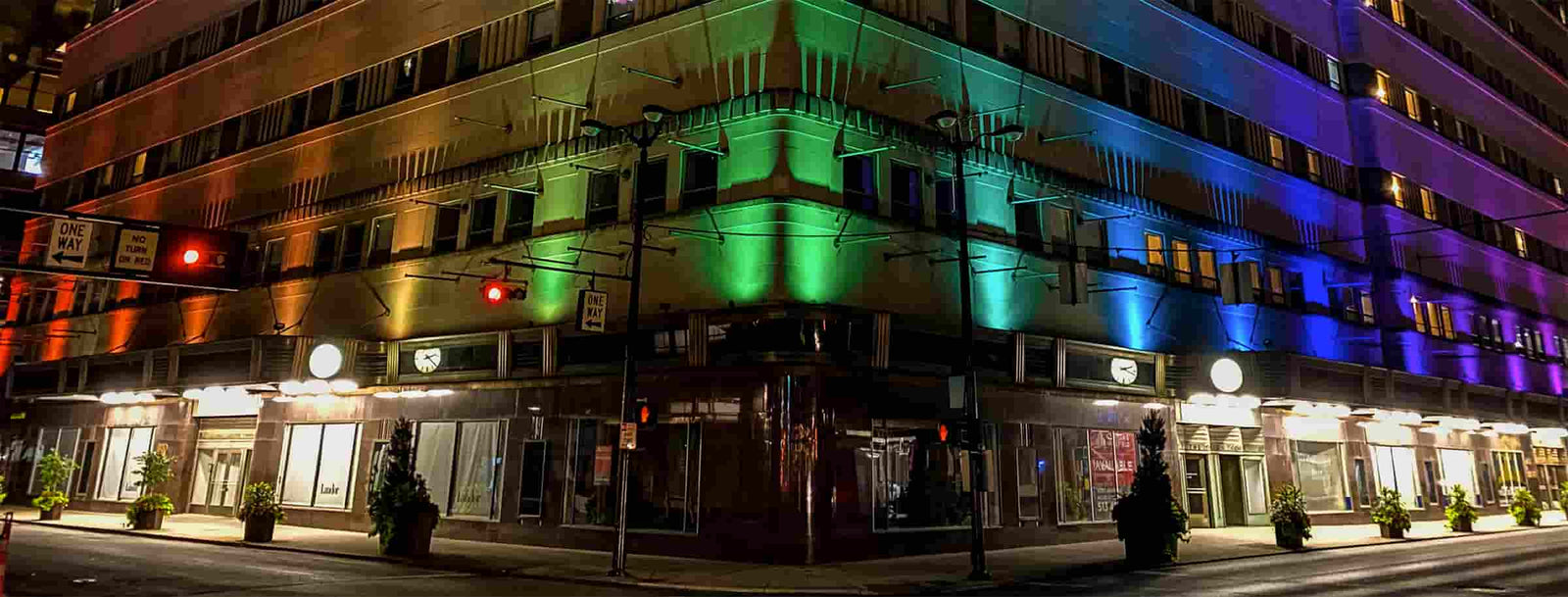 color commercial outdoor lighting on a building in downtown Cincinnati in rainbow colors