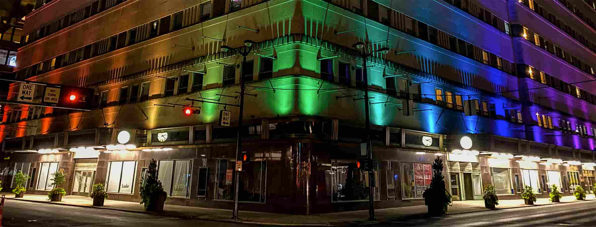 color commercial outdoor lighting on a building in downtown Cincinnati in rainbow colors