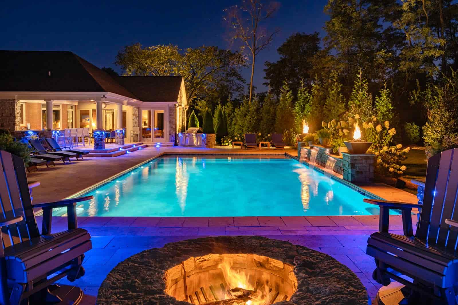 Wireless outdoor lighting for hardscape and pool area by Haven Lighting