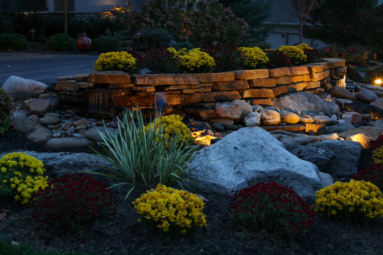 Commercial outdoor lighting in a garden - Haven Lighting
